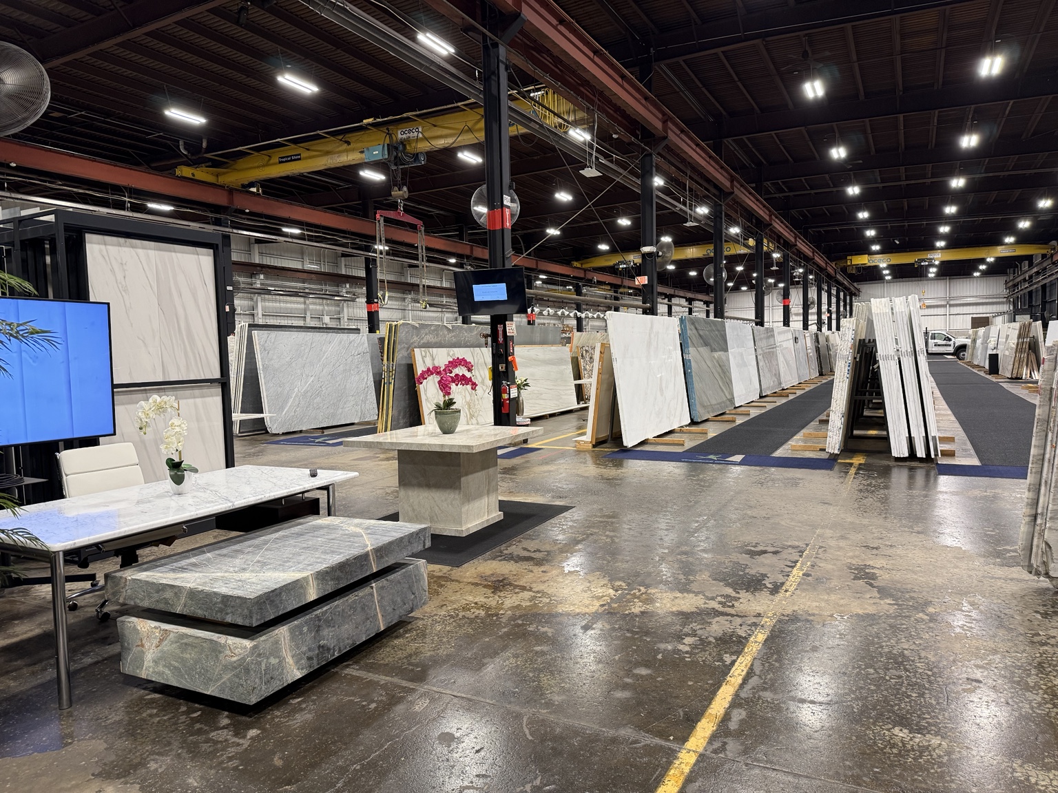 Wide view of the Tropical Stone showroom and slab warehouse